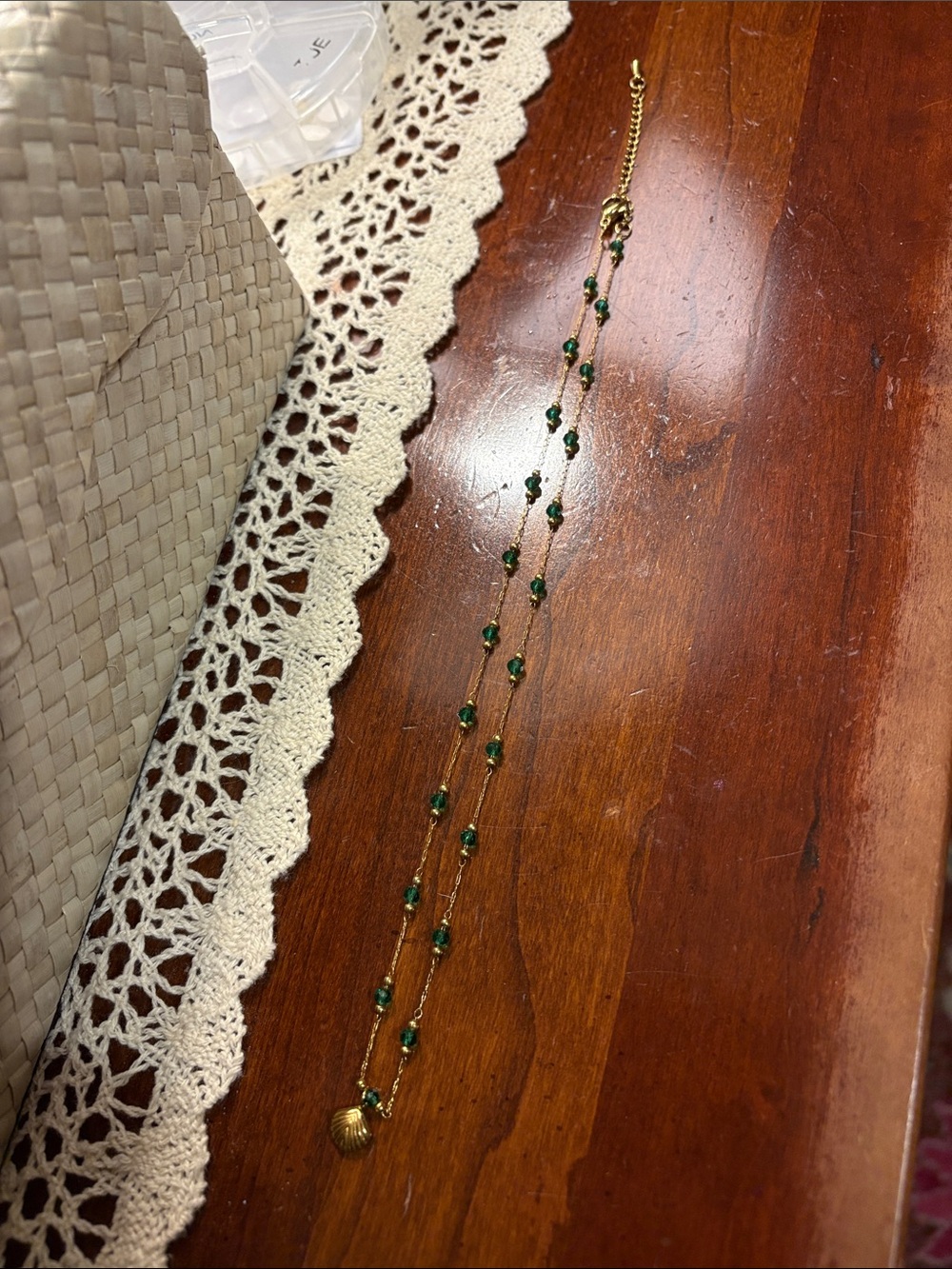 Gold Double-Strand Necklace with Emerald Beads and Shell Charm